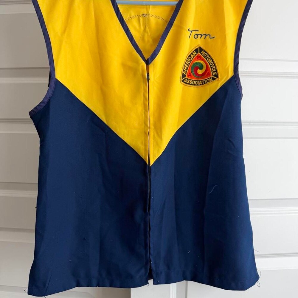 Vintage 70s AMA yellow and navy blue color-blocked vest with embroidered logo #m